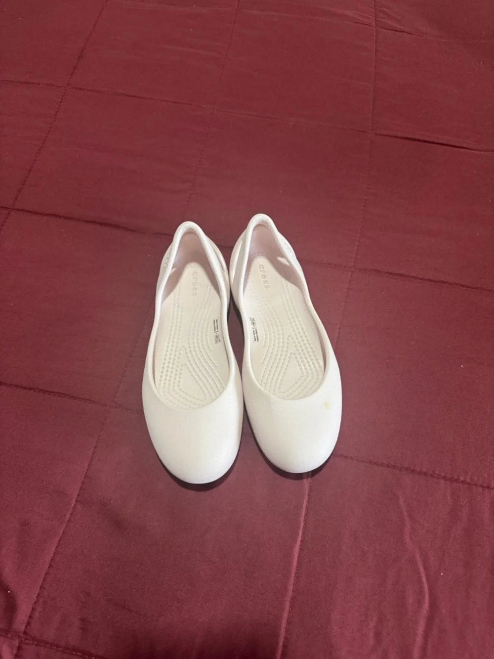 CROCS kids pink Slip-On Ballet Flats they have a little stain on left shoe